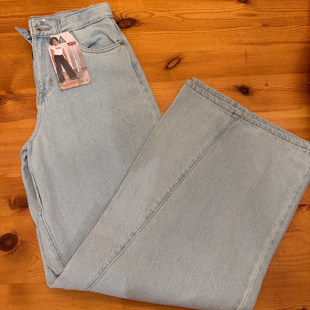 Levis 94 BAGGY WIDE LEG MID RISE
LOOSE ADJUSTABLE WAIST Girls 14A